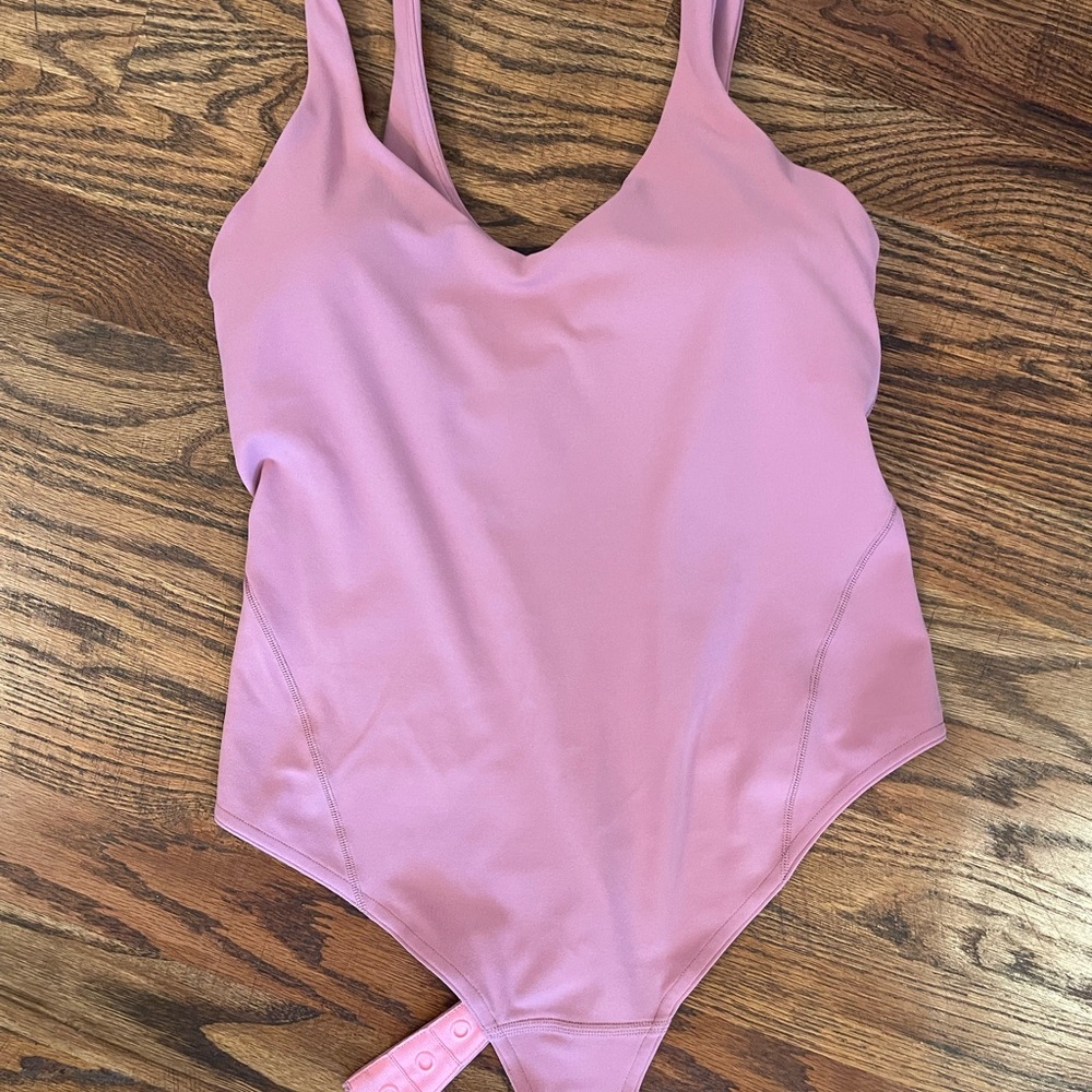 Lululemon Athletica Pink Bodysuit size 6 pink   Wundermost ultra soft v neck